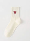 Holiday Bow Socks In 2 Colors
