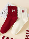 Holiday Bow Socks In 2 Colors
